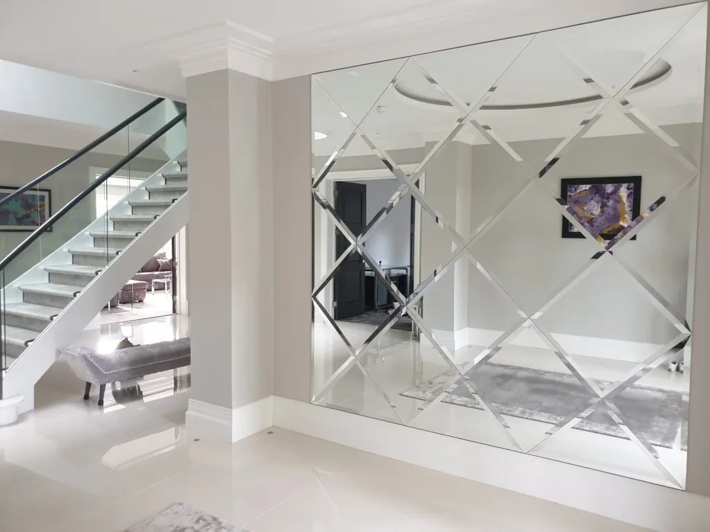 glass mirror near stairs