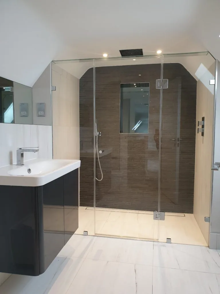sink and glass door shower